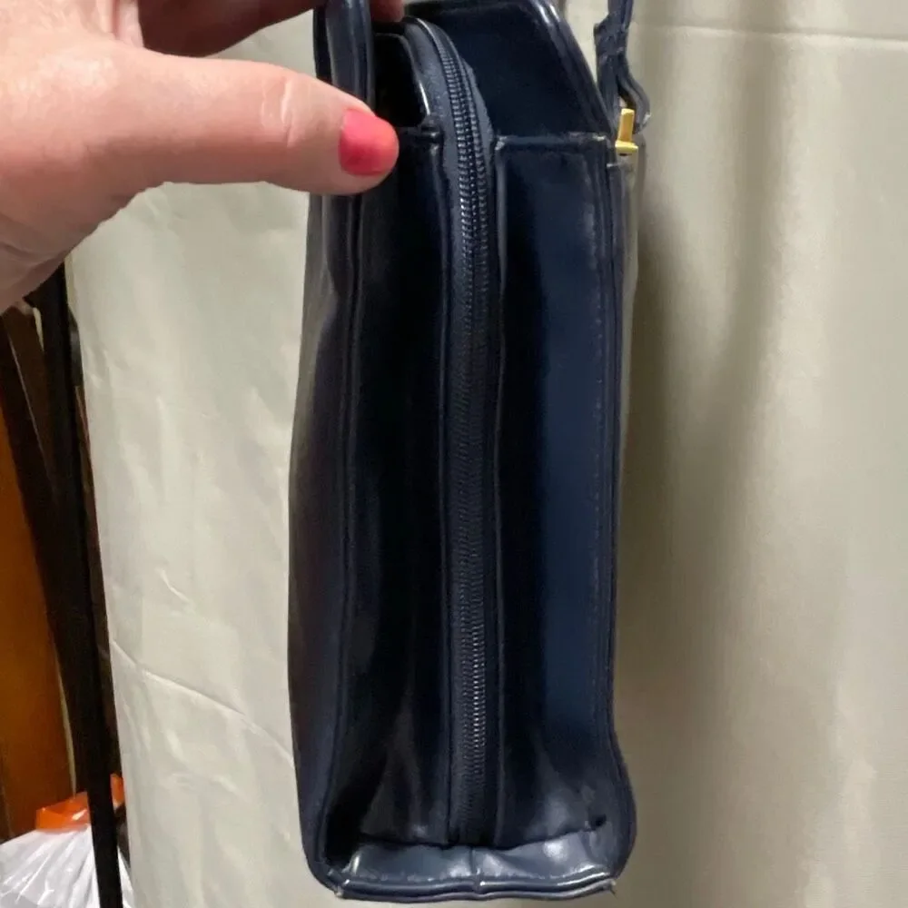 Vintage Colette blue leather shoulder bag.